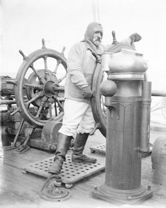 Mortimer McCarthy at wheel of Terra Nova